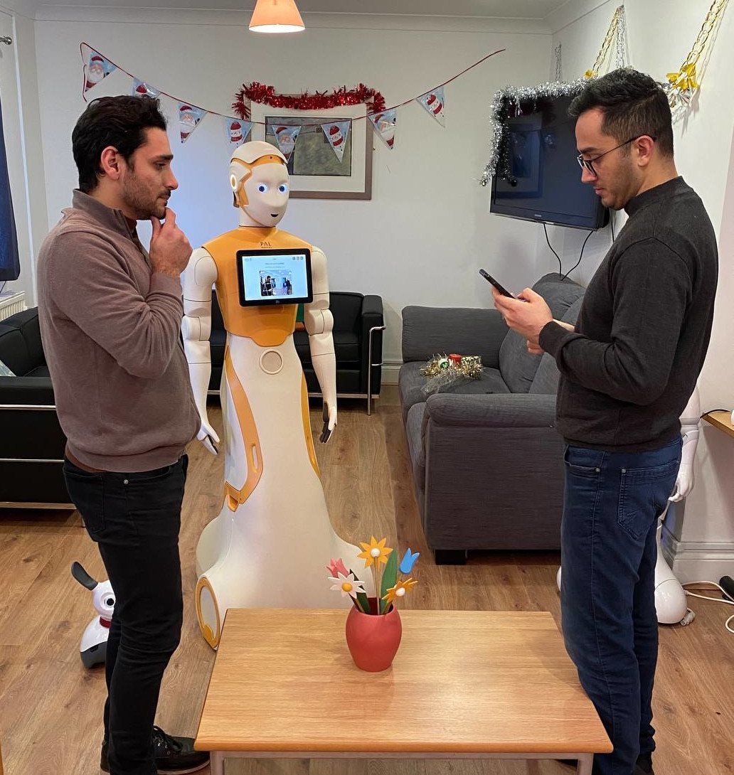 ARI humanoid robot in triadic social interaction at Robot House, University of Hertfordshire